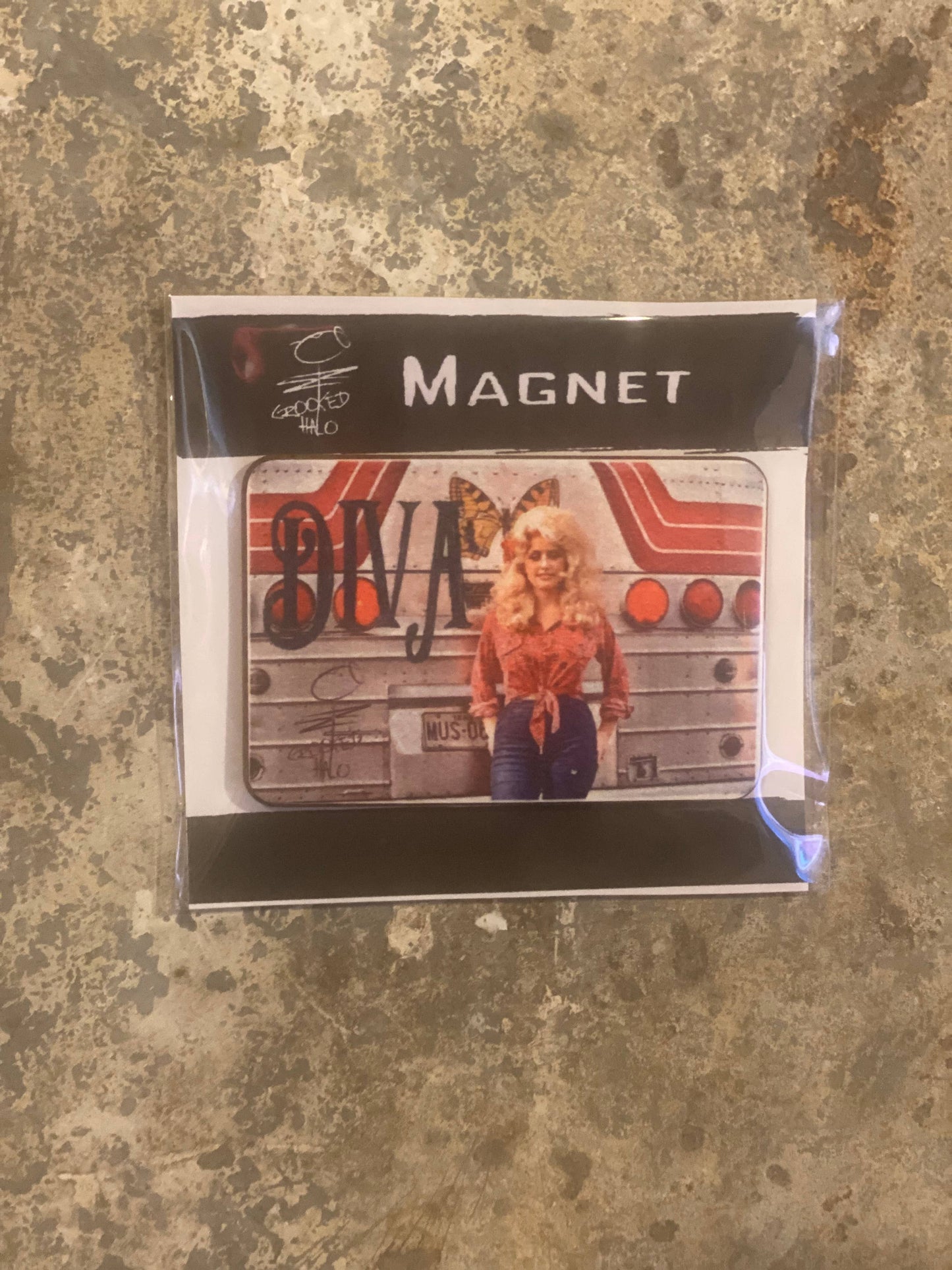 Crooked Halo - Diva Dolly Magnet - Packaged with backing in a cello bag.