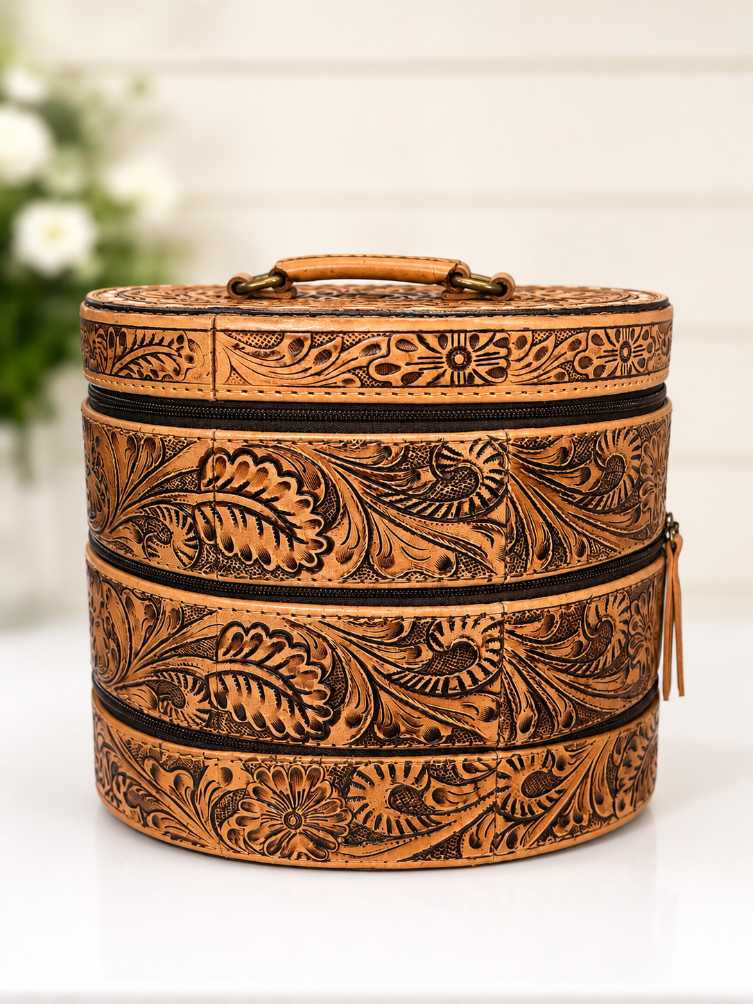 Triple decker jewlery box with top handle.