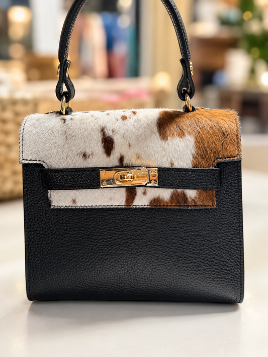 The Cowhide Socialite Italian was pebbled leather! Made in Italy!
